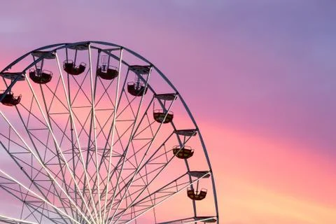 Ferris wheel at the sunset Stock Photos
