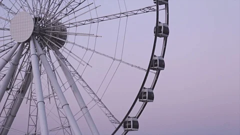 Ferris wheel at sunset under a beautiful sky Stock Footage 114996529