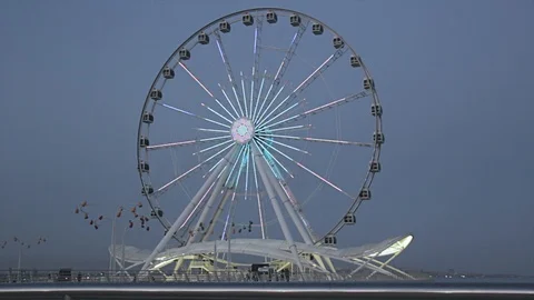 Ferris wheel at sunset under a beautiful sky Stock Footage 115059192
