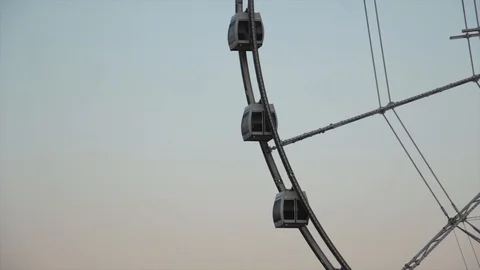 Ferris wheel at sunset under a beautiful sky Stock Footage 115249474