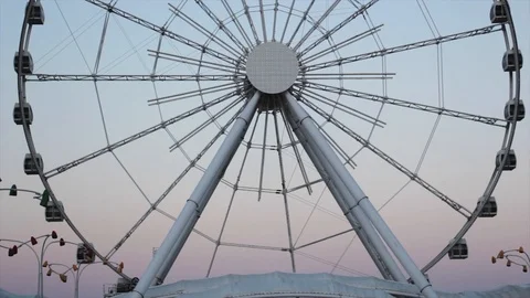 Ferris wheel at sunset under a beautiful sky Stock Footage 115252928