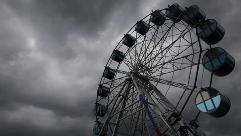 Ferris Wheel Timelapse in a cloudly weather  Clouds Original Colour Stock Footage 77560772