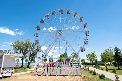 Ferris Wheel in tourist resort Stock Photos