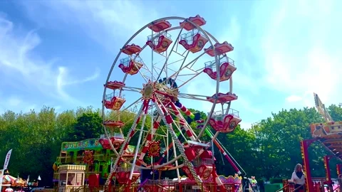 Ferris wheel turning at Brighton Level Funfair Stock Footage 334560271