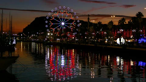 Ferris wheel turning at sunset.Time Lapse. Stock Footage 197753904