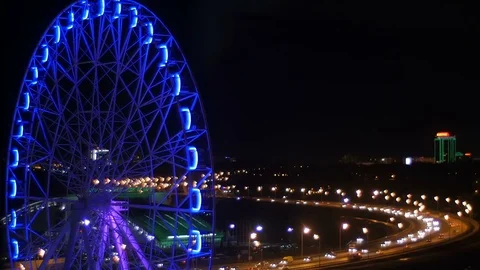 Ferris wheel . View from the hotel window at night. night city Stock-Footage 75345354