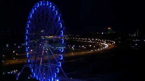 Ferris wheel . View from the hotel window at night. night city Stock Footage 75439351