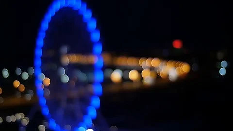 Ferris wheel . View from the hotel window at night. night city Stock Footage 75439409