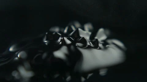 Ferrofluid and water drop, Slow Motion Stock Footage 11055597