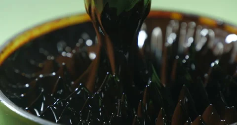 Ferrofluid. Ferromagnetic Fluid Creates Amazing Drawings Spikes in a Magnet.. Stock Footage 324860595
