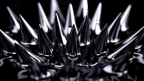 Ferromagnetic fluid (Ferrofluid) when exposed to a magnetic field creates ama Stock Photos