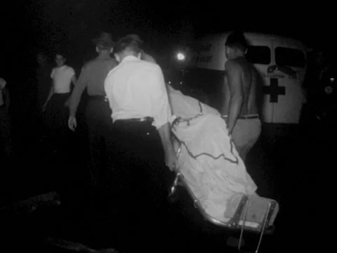 Ferrum, VA - 1960s: Corpse carried to ambulance 스톡 동영상 234239202