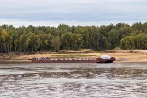Ferry across the river. Stock Photos