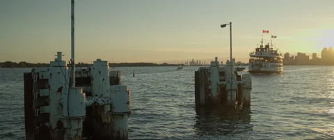 Ferry approaching at sunset Stock Footage 207834469