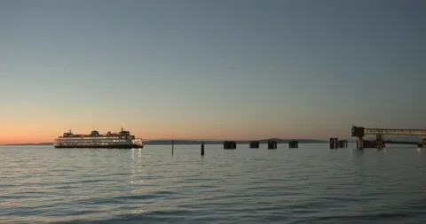 Ferry approaching terminal at dusk Video stock 137002218