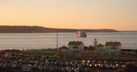 Ferry approaching terminal at sunset Video stock 137129747