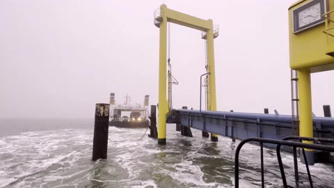 Ferry arriving at pellworm in slow motion. Stock Footage 231172001