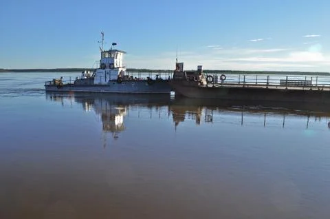 Ferry on the big river. Stock Photos