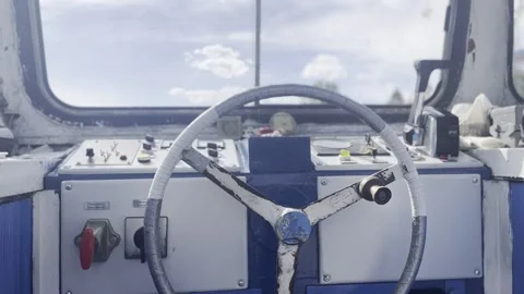 Ferry Boat Captain Cabin with Steering Wheel and Blue Sky Through Window Clo Vídeos de archivo 342030886
