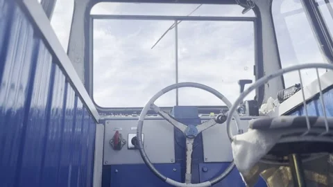 Ferry Boat Captain Cabin with Steering Wheel and Blue Sky Through Window2 Vídeos de archivo 342032655