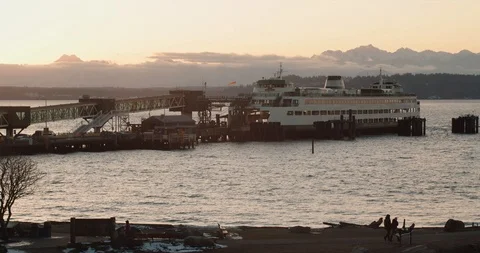 Ferry Boat Docked in Edmonds WA with Olympic Mountains in view Stock Footage 102466813