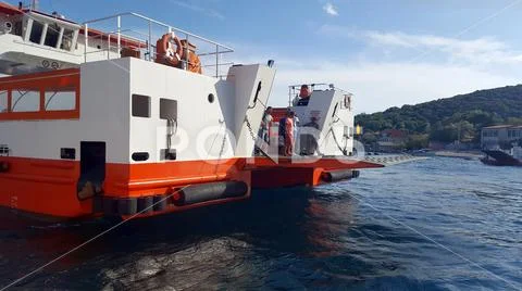 Ferry boat is floating over the sea and transfer passenger or tourist between Stock Photos