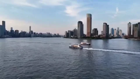 Ferry Boat on Hudson River with New York City Skyline Aerial View 스톡 동영상 343597939
