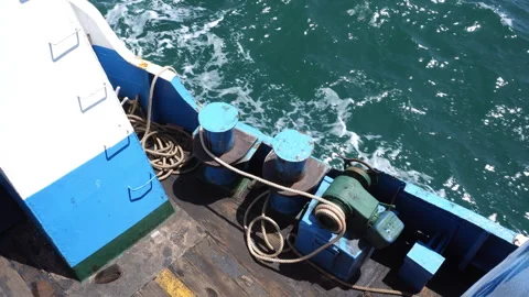 Ferry boat hull and deck equipment cruising through blue sea water 動画素材 340185138