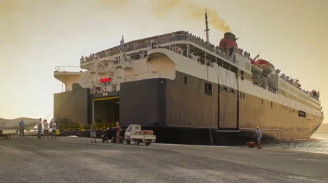 Ferry boat passenger ship loading people and vehicles for a trip. Stock Footage