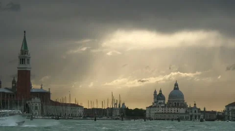 Ferry boat passing by in front of beautiful Venetian sunset scenery Stock Footage 56437145
