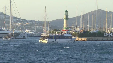 Ferry Boat Passing A Lighthouse Bodrum Turkey Stock Footage 121271202