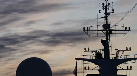 Ferry boat radar surrounded by a set of antennas, sunset Stock-Footage 60582696