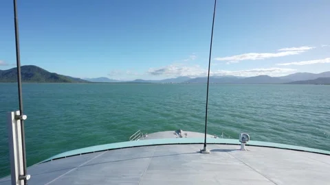 Ferry boat sailing on tranquil turquoise ocean waters 스톡 동영상 330547127