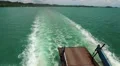 Ferry boat sails from the mainland to the Koh-Chang island, Thailand HD Footage