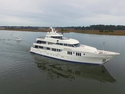 Ferry boats sailing in river during dusk Video stock 83689935