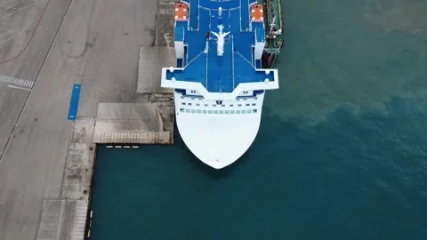 Ferry Bow Docked at Concrete Pier with Visible Harbor Water Pollution Stock Footage 343993622