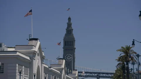 Ferry Building Clock Tower American Flag Clear Blue Sky San Francisco Video stock 344953592