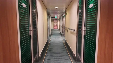 Ferry Cabin Corridor with Gray-blue Carpet and Green Doors 库存影片 347683429