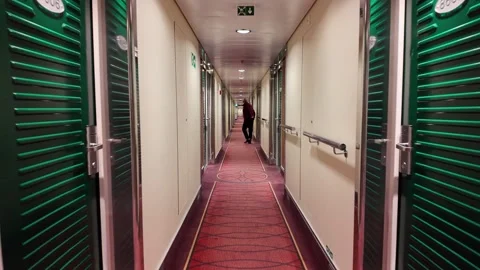 Ferry Cabin Corridor with Red Patterned Carpet and Green Doors Video stock 347683432