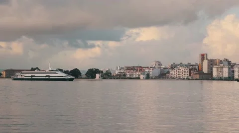 Ferry-Catamaran Sails on a Background of the City Stock Footage 59765054