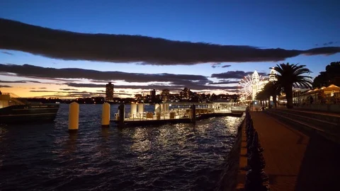 A ferry is coming to Milson Point in the evening Stock Footage 103428921