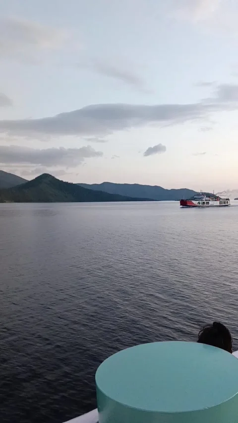 Ferry crossing during sunset Stock Footage 281391261