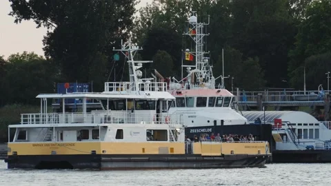 Ferry crossing river with commuters standing on the deck Stock-Footage 219252823