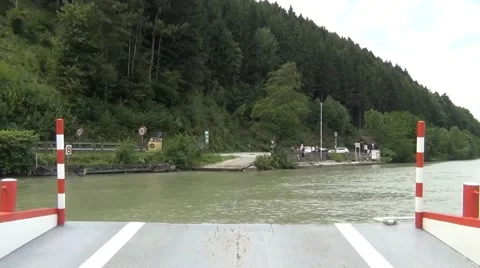 A ferry is crossing the river Donau in Germany Stock Footage 61166558