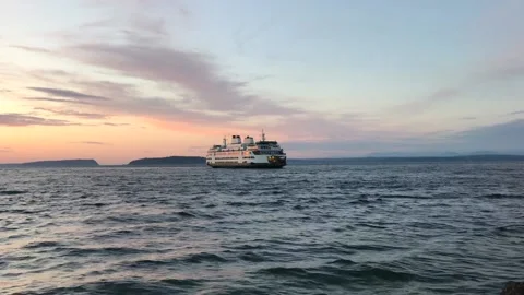 A ferry crossing at sunset Stock Footage 234568930