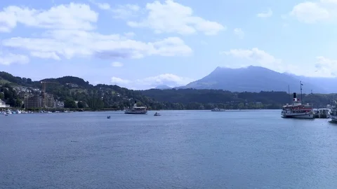 A ferry crossing Vierwaldstattersee into Lucerne Stock Footage 114821653