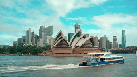 A ferry cruising in front of the Sydney Opera House. Australia, April 9, 2022. Stock Footage 333167169