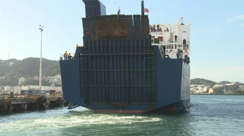 Ferry departs its berth Stock Footage 950817