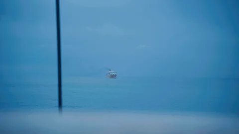 Ferry in the distance Stock Footage 93387996