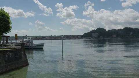 Ferry to the dock while boarding passengers Stock Footage 153854636